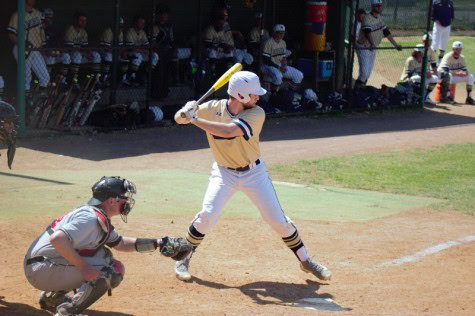 Daniel Heleine up to bat against Wheeling Jesuit