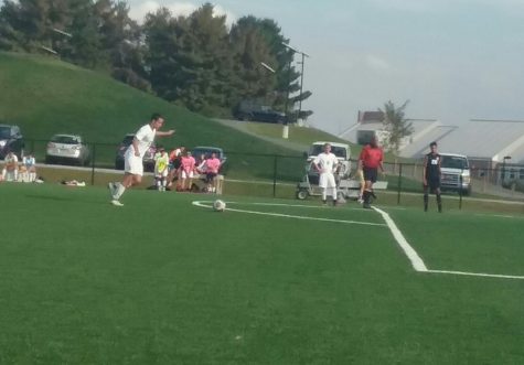 Jeff Kammerer of the Rams takes a free kick. 