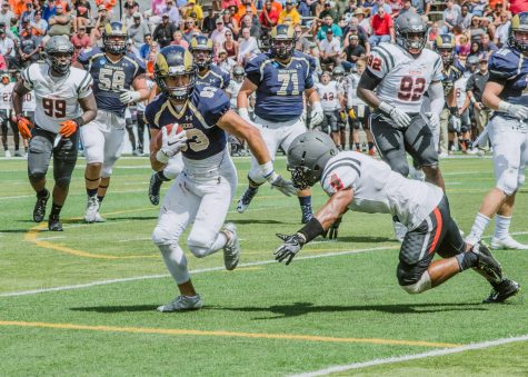 Ryan Feiss breaks towards the sideline to pick up more yards 