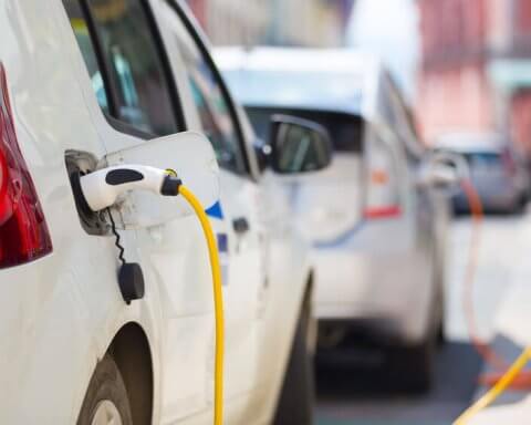 Electric Car in Charging Station.