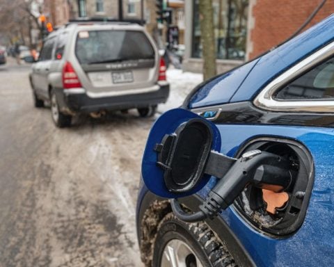 An EV charges up on the street in February in Montreal