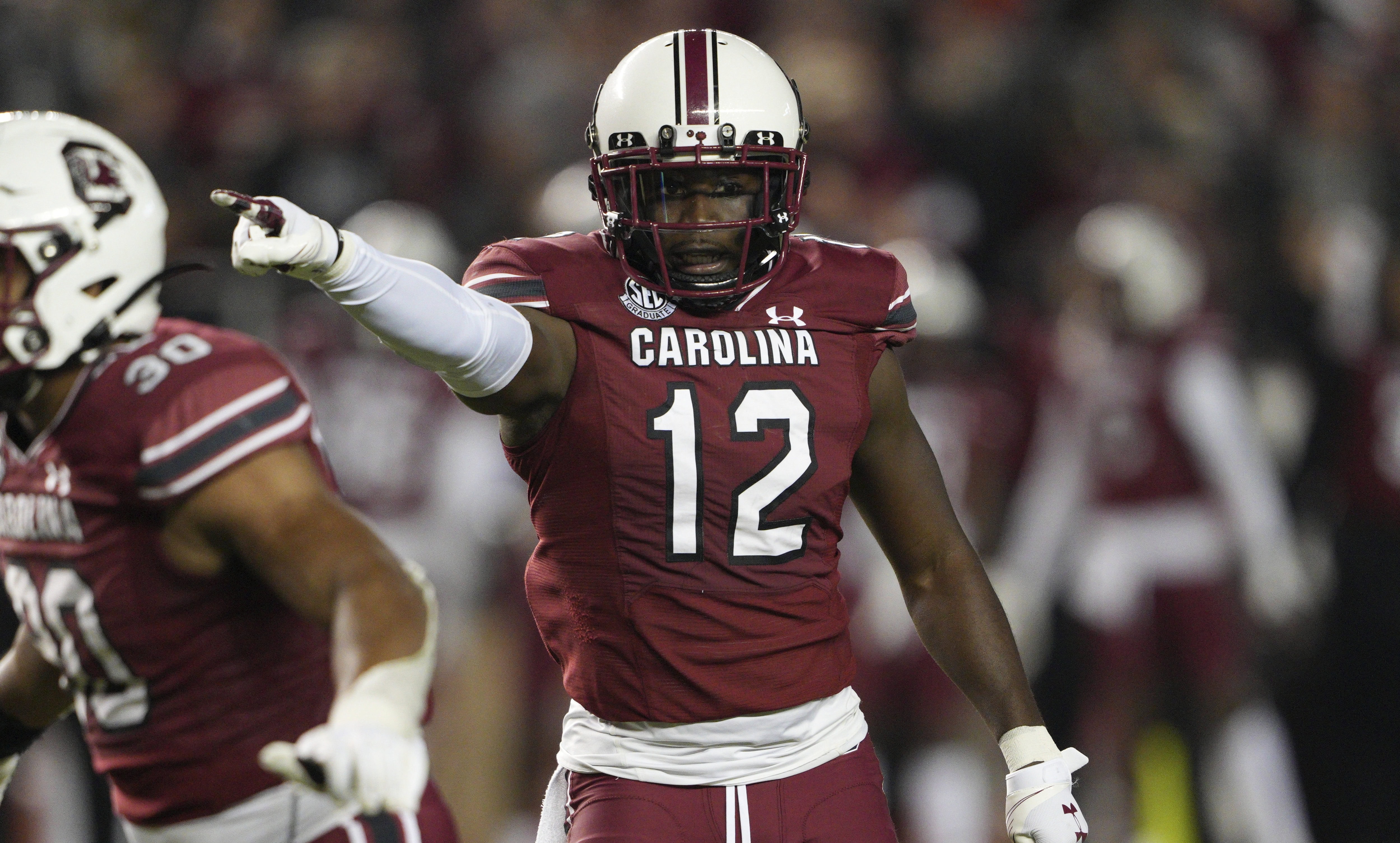 Football player Jaylan Foster signaling on the field during South Carolina vs. Auburn at Williams-Brice Stadium