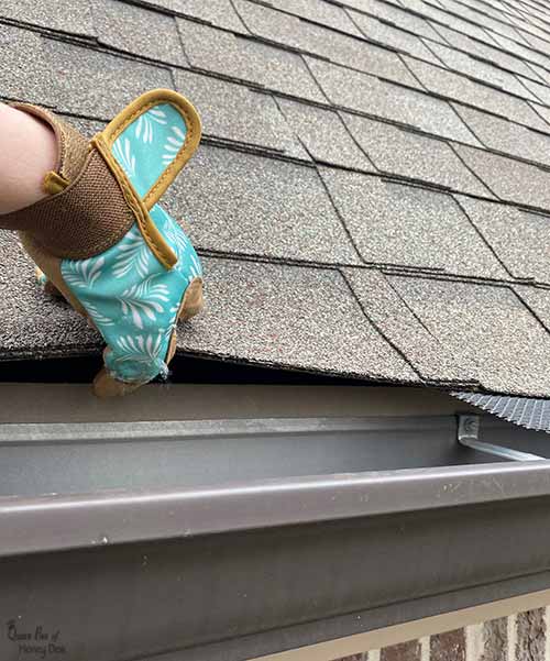 lifting roof shingle