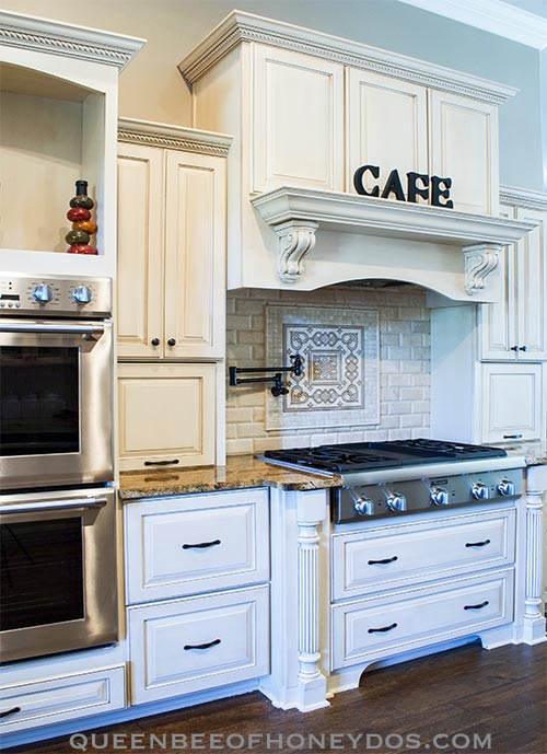 cooking center with range hood and cooktop