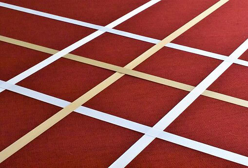 center of picture board with 6 ribbons affixed