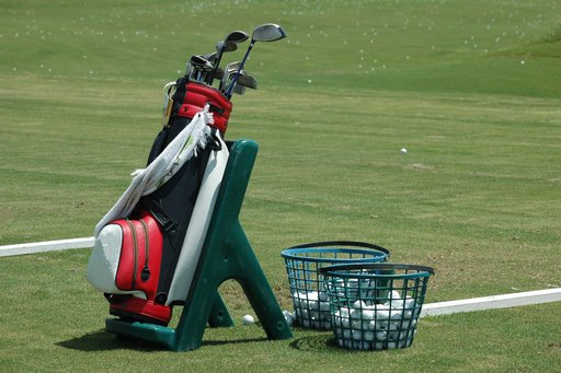 golf bag, clubs, ball