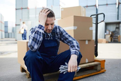 Exhausted warehouse worker.