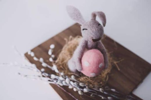 Easter bunny holding egg