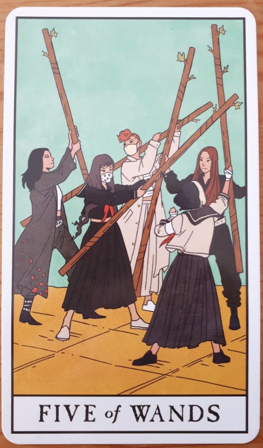 la carte de tarot Five of Wands de l'incroyable jeu de tarot Modern Witch