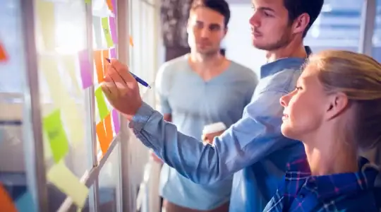 Young creative business people at office