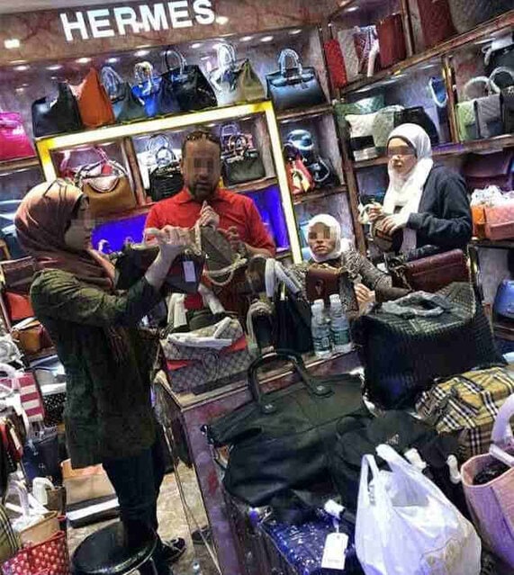 foreign customer picked replica bags in the booth