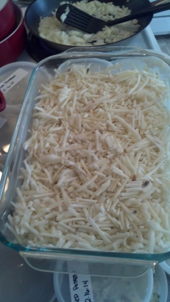 Then the potato casserole, butter a casserole dish, layer it with lots of hashbrowns (I really don't work with 'quantities' its what looks good to me, sorry or is convienient ie one whole onion instead of 1 cup or half cup etc. :))
