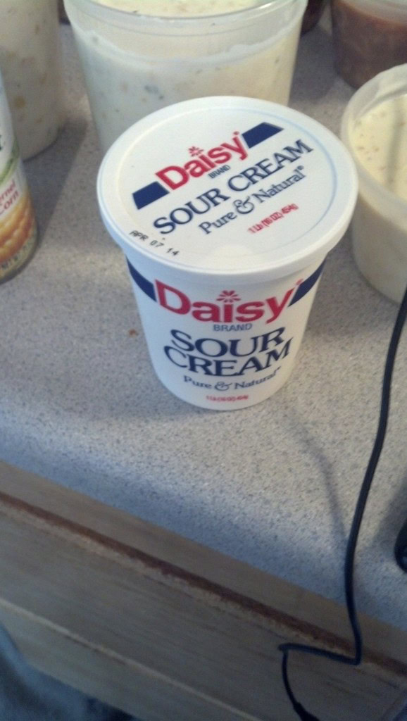 and a half a package of sour cream and a little cheddar cheese