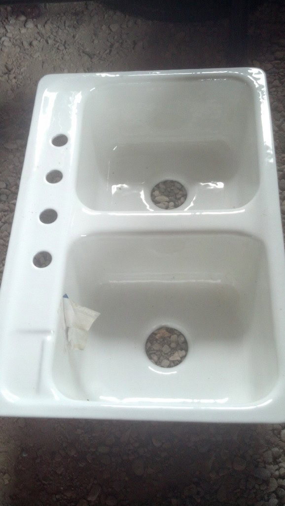 I got this kitchen sink today from Craigslist.  It is an undermount white sink, brand new, never installed.  I bought it for about 15% of the cost.  Win!
