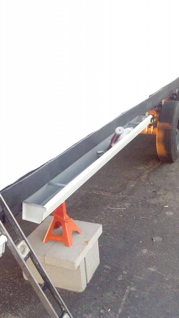 Here is a planter installed on the trailer.  Soon I ought to be able to plant the ivy in there and get it going to start growing up the side of the house and over the roof.