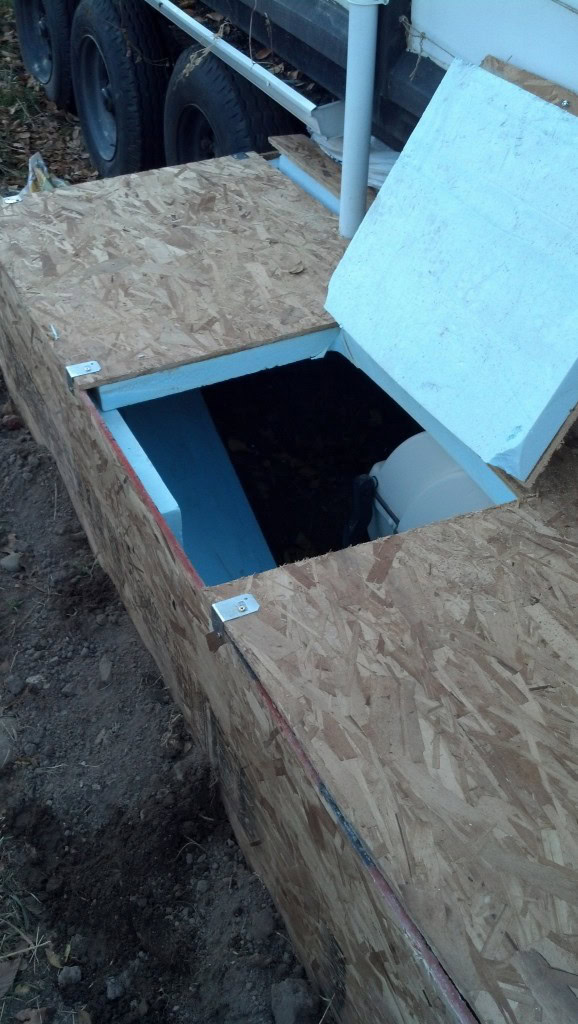 I had to put in a hatch so I could still rotate the bin on my composter once  week.  There are some extra pieces of insulation in there :)