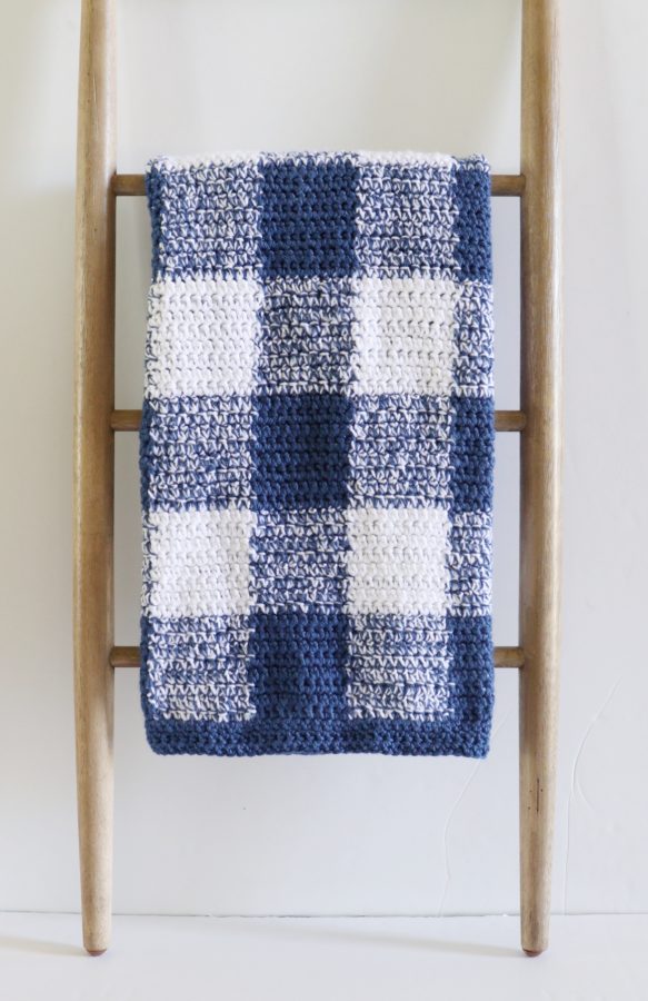 Navy Gingham Crochet Blanket on ladder