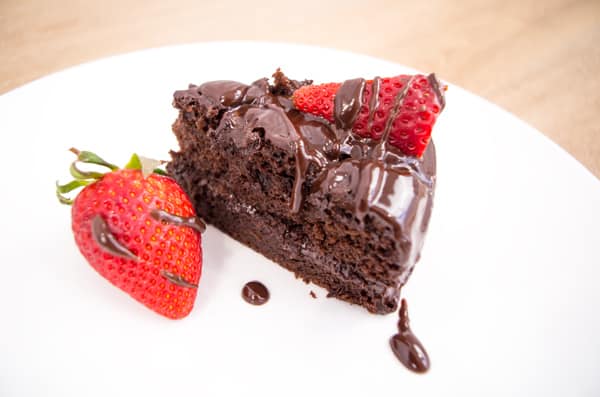 choc cake slice with strawberries