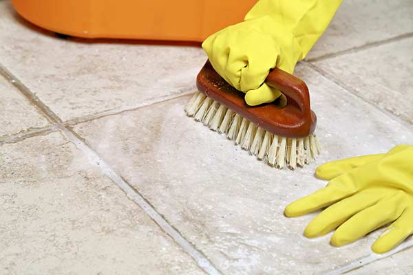 scrubbing tiles and grout