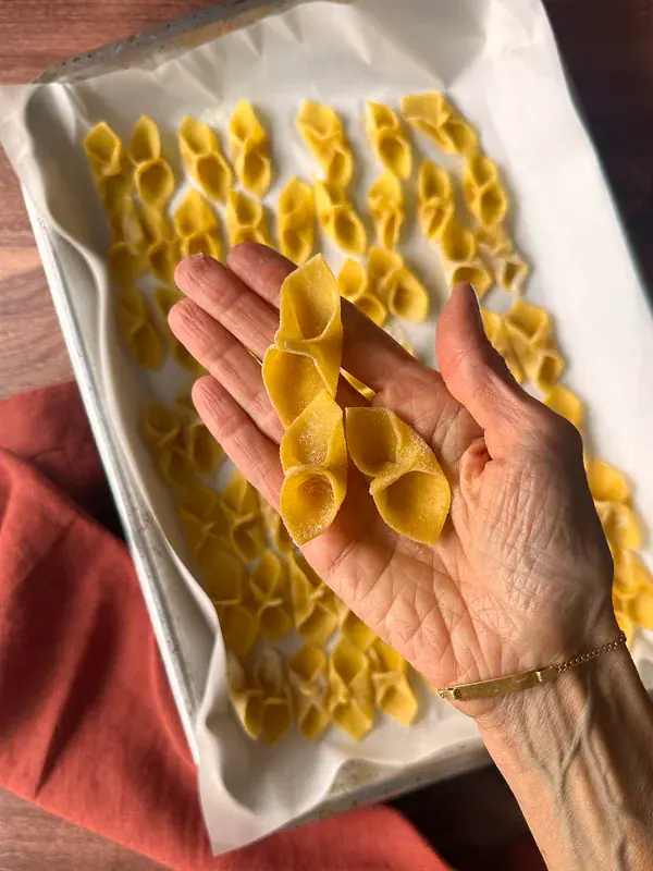 HOMEMADE BARCHETTE PASTA LITTLE BOATS PASTA SHAPE IN HAND