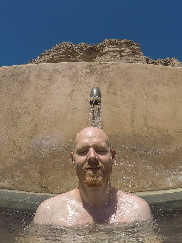 Buddy letting the warm water at the iron pool run over his head