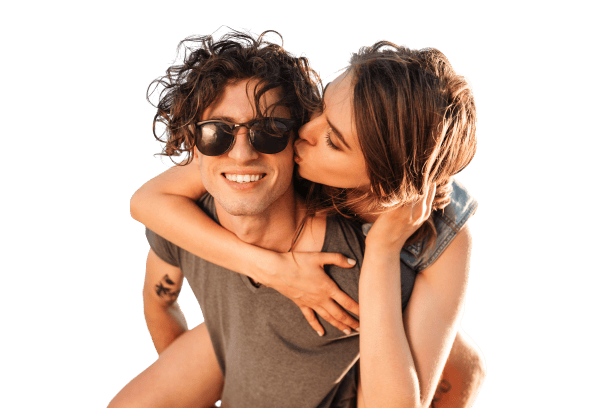 How to Attract a Good-Looking Girl 4 young man piggybacking his girlfriend