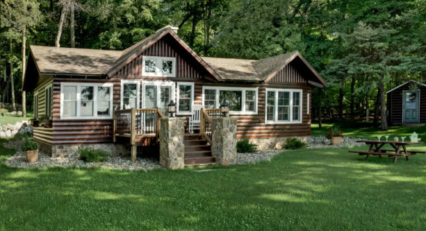 tiny log cabin porch with front stairs to reach it