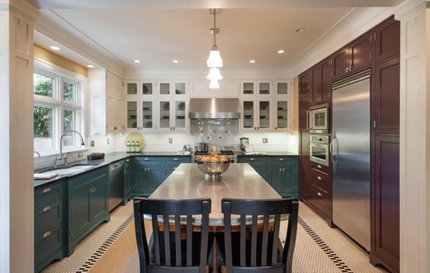 black and white tile border with a square mosaic pattern kitchen floor to frame the island