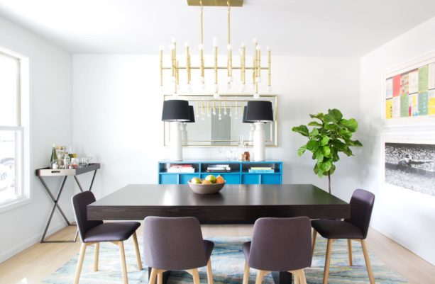 small dining room with a tiny tray used as a bar