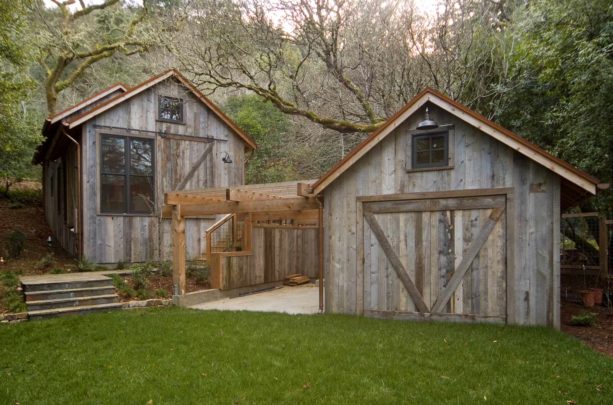 rustic post and beam carport combined with cedar panel siding