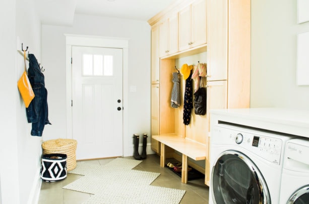 combination of ceramic tiles and carpet tile in a laundry room floor for an aesthetic look