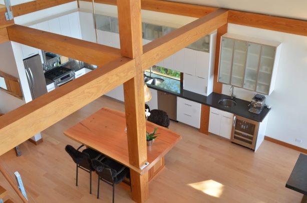 wood decorative support beam attached to a dining table