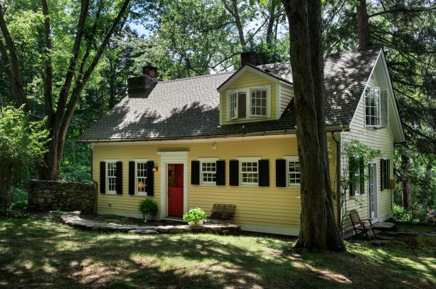 navy shutter color that goes with a yellow house