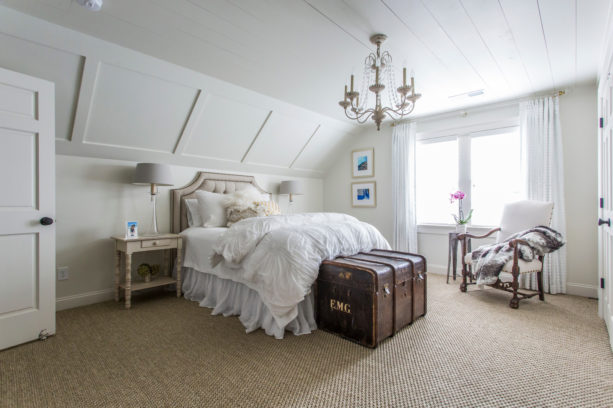 classic extra bedroom in the attic with crisp slanted walls