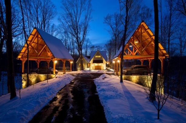 lakeside timber frame post and beam carport with natural stone base