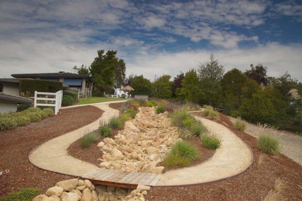 rustic style backyard with gravel path landscape to get the desert look