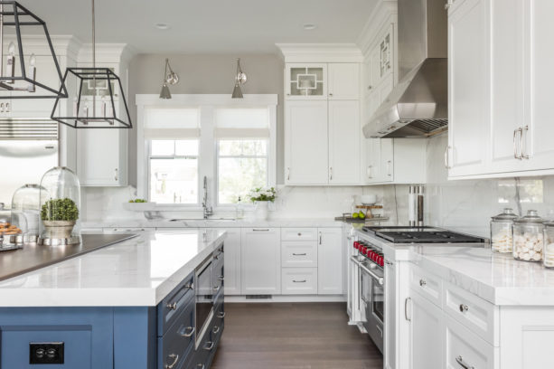 double hung windows over undermount sink in an l-shaped kitchen