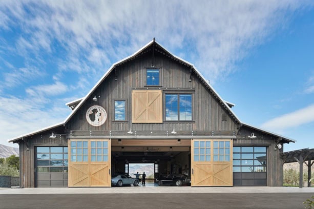 half x brace side sliding exterior barn door designs for a large country garage