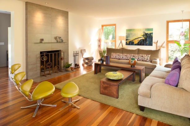 neutral-colored tiled fireplace in mid-century modern style with metal mantel