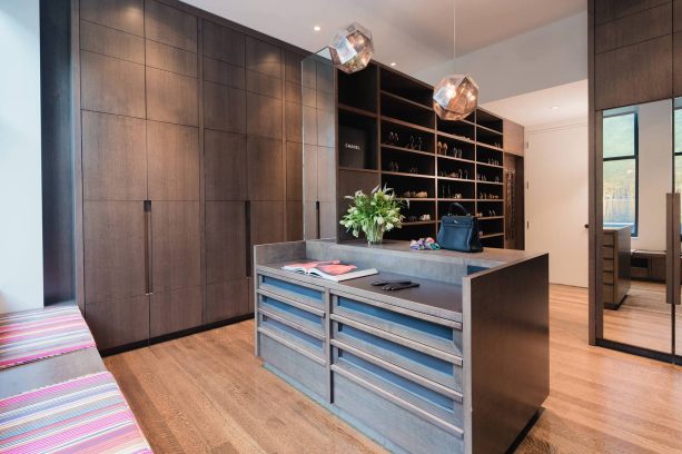 stainless steel hanging pendants over storage cabinet as a walk-in closet lighting