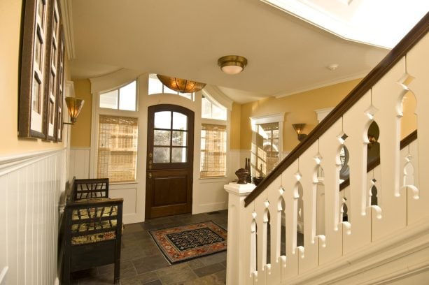 weave bamboo shade as a window treatment for the sidelights