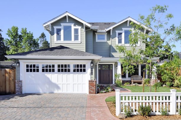 white painted wood garage door with glass panels