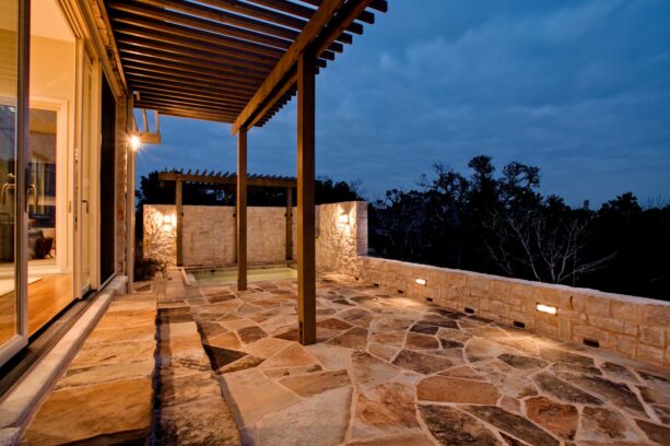 multicolored natural stone balcony flooring with white grout