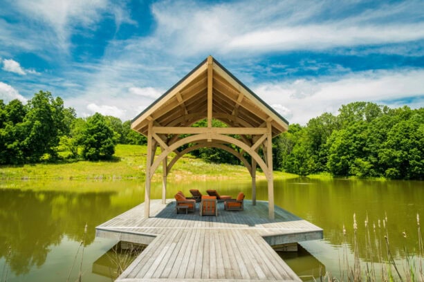 gazebo with a gable roof on a beach-style deck