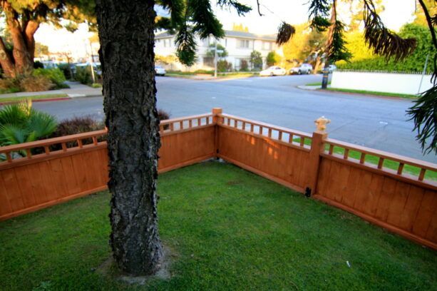 low craftsman-style fence in front yard landscaping