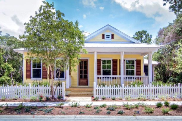 lovely vinyl siding gable roof in a yellow ranch style house