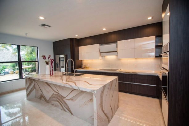 brown flat-panel cabinets perfectly combined with multicolored countertops kitchen for a warm and elegant look