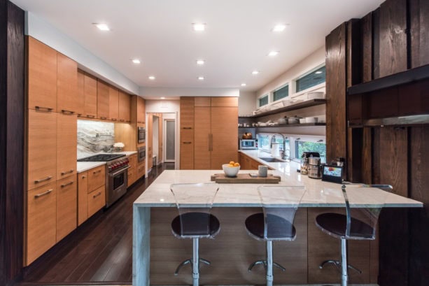 dark brown kitchen color with light brown flat-panel cabinets and white countertops combination for natural look