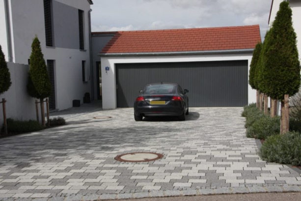 two car garage with black side sliding door