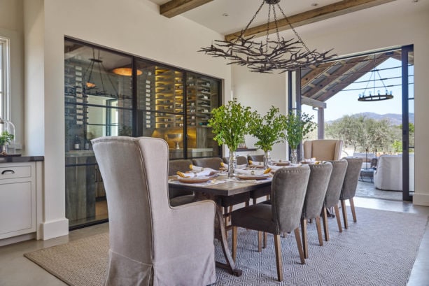 farmhouse dining room with a bar area and wine nook